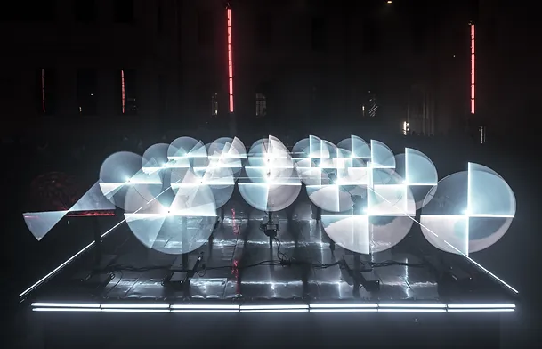 Dorna robots in CODA - a stage performance by Collectif Scale - showcasing their high-degree design and motion profiles - creating aesthetic circular movements using lights.